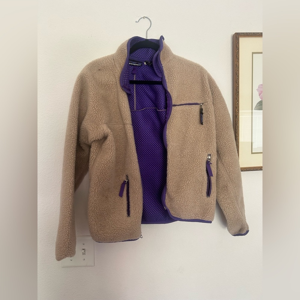 Patagonia tan and purple trim teddy bear jacket with zippers